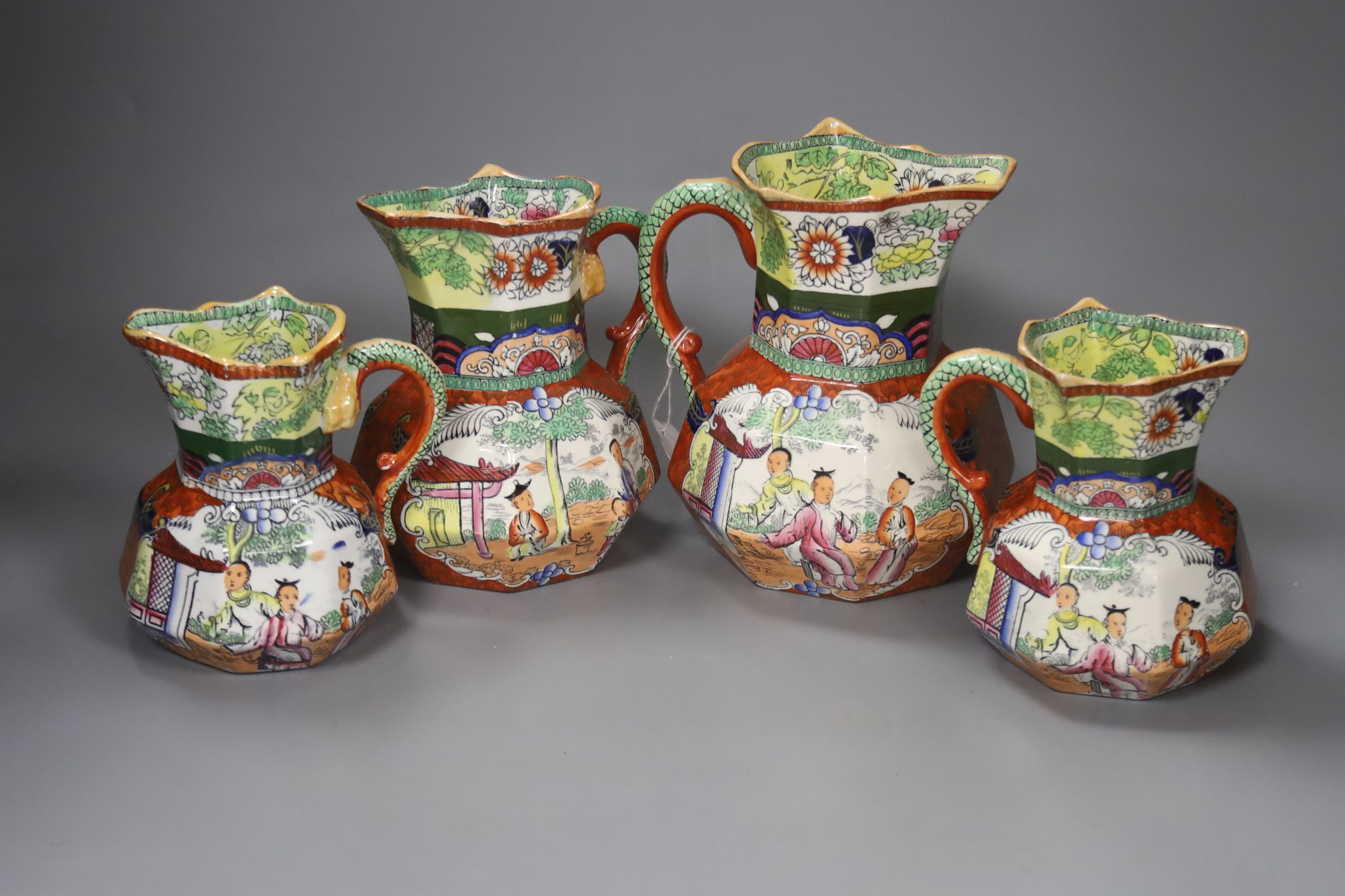 A graduating set of four Masons Ironstone jugs